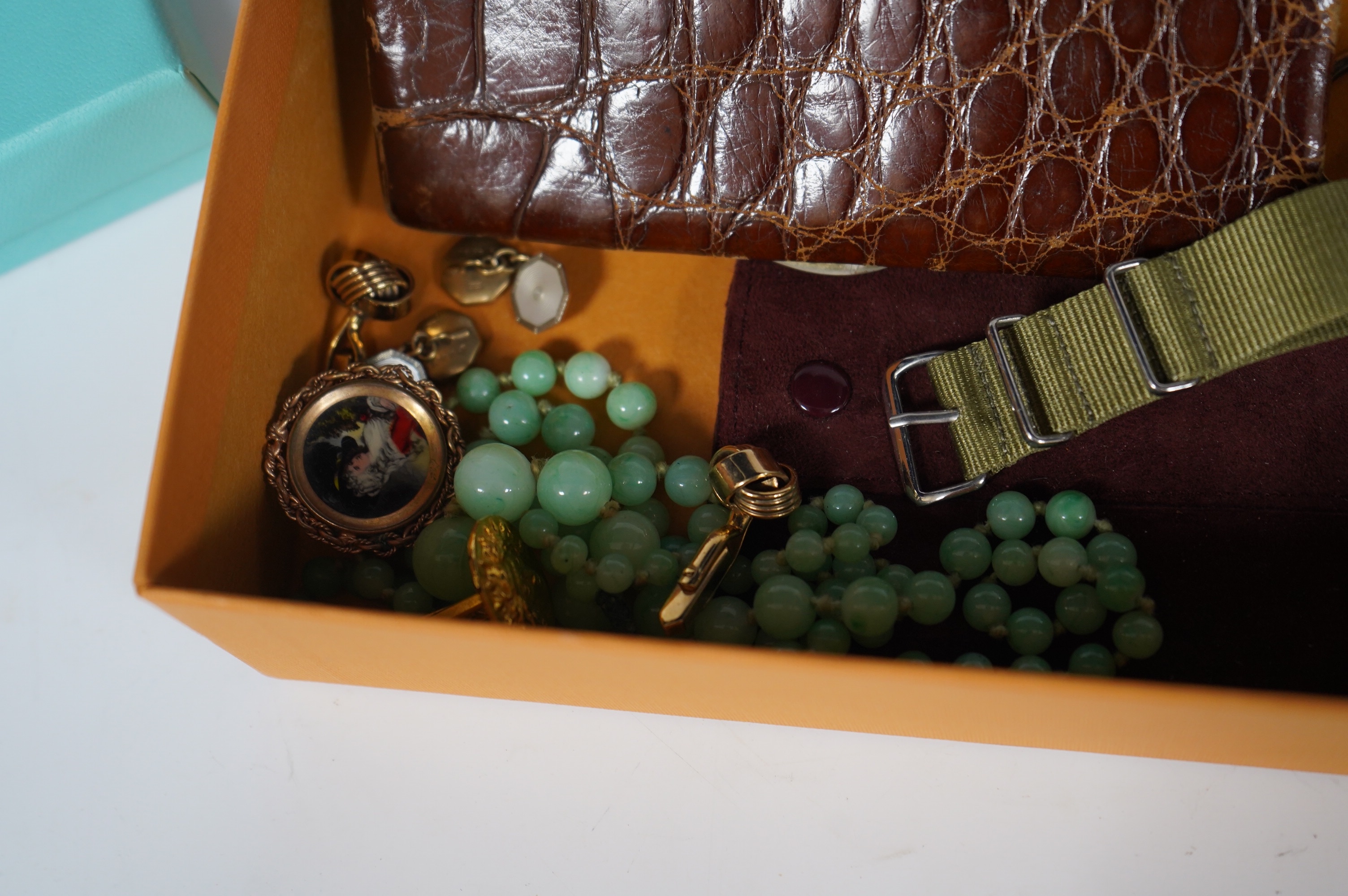 A group of minor jewellery, etc., including a silver Rolls Royce key fob, silver money clip etc. Condition - poor to fair